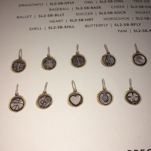 Real sterling silver and brass charms.